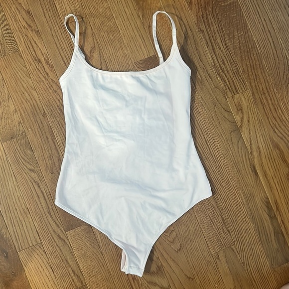 Free People Women’s Pale Pink Bodysuit Size Small - Picture 1 of 4